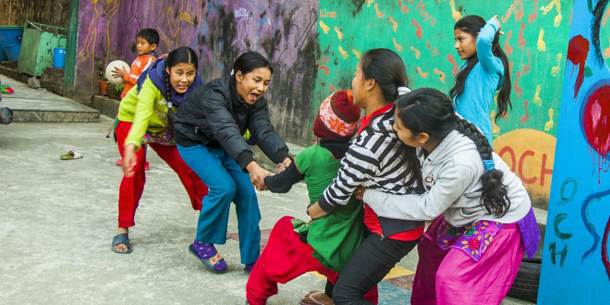 Children playing together in the community
